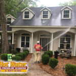 A professional pressure washing service cleaning a property in the Baker Place neighborhood of Bradfordville, Tallahassee, Florida.