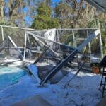 Pool enclosure collapse due to snow