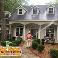 A professional pressure washing service cleaning a property in the Baker Place neighborhood of Bradfordville, Tallahassee, Florida.